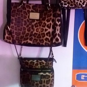 Leopard print purses. By Nicole Miller.